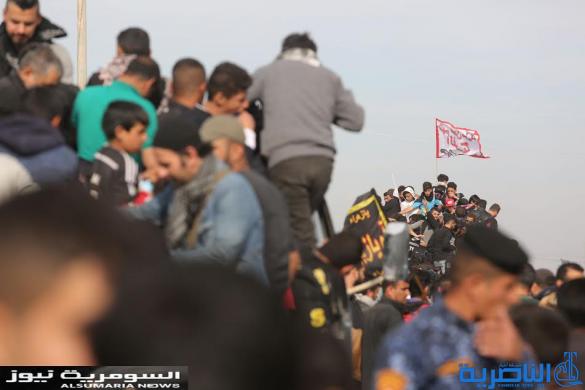 بالصور.. عربات عسكرية تتزاحم لنقل زوار الأربعينية