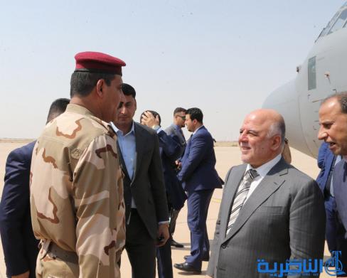 بالصور:وصول رئيس الوزراء حيدر العبادي الى مطار الناصرية الدولي