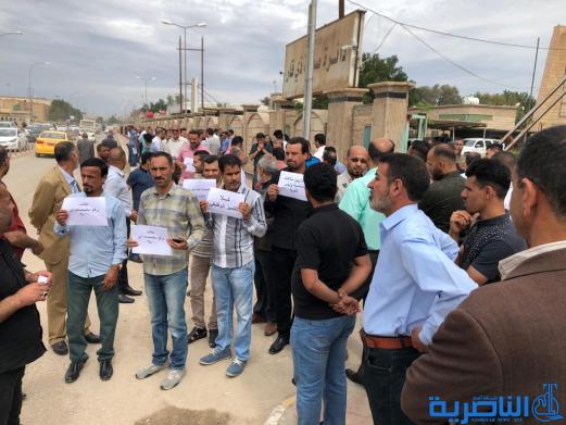 موظفو صحة ذي قار يتظاهرون للمطالبة بتحسين رواتبهم - تقرير مصور-