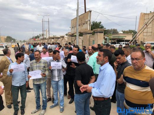 موظفو صحة ذي قار يتظاهرون للمطالبة بتحسين رواتبهم - تقرير مصور-