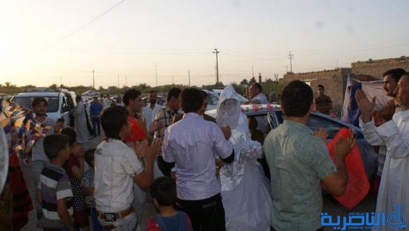 الناصرية تشهد اول زواج لعريسين نازحين من الموصل - تقرير مصور -
