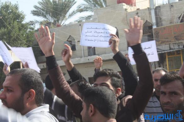 الاجراء اليوميون في الصحة والمجاري يتظاهرون في الناصرية لتثبيهم على الملاك الدائم - تقرير مصور -