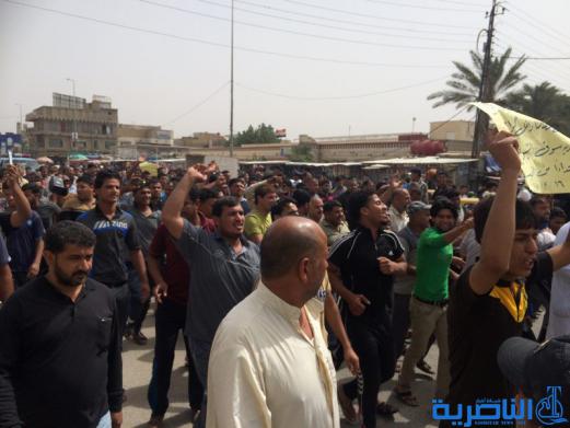 سواق الاجرة يتظاهرون في الناصرية احتجاجا على نقل المراب الداخلي - تقرير مصور -