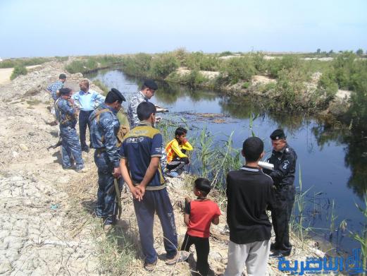 بالصور : تسرب نفطي يتسبب بتلوث احد انهار الناصرية