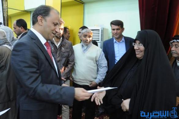 ذي قار توزع التعويضات المالية على اكثر من 1700 متضرر من الامطار والسيول - تقرير مصور - 