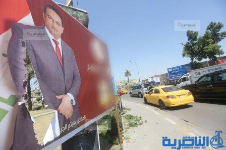 تمزيق دعايات المرشحين.. البعض يئس من التغيير واخرون يسرقون اطارها (صور)