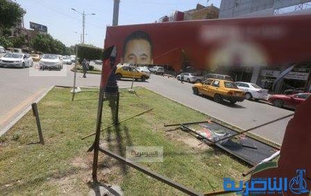 تمزيق دعايات المرشحين.. البعض يئس من التغيير واخرون يسرقون اطارها (صور)