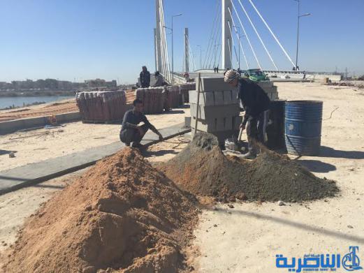  بالصور : اكتمال اول الجسور المعلقة فوق فرات الناصرية