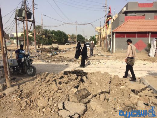  بالصور : اعمال صيانة تتسبب بزحمة مرور خانقة قرب مجلس ذي قار