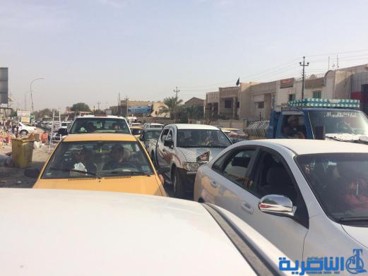 بالصور : اعمال صيانة تتسبب بزحمة مرور خانقة قرب مجلس ذي قار