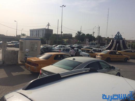  بالصور : اعمال صيانة تتسبب بزحمة مرور خانقة قرب مجلس ذي قار