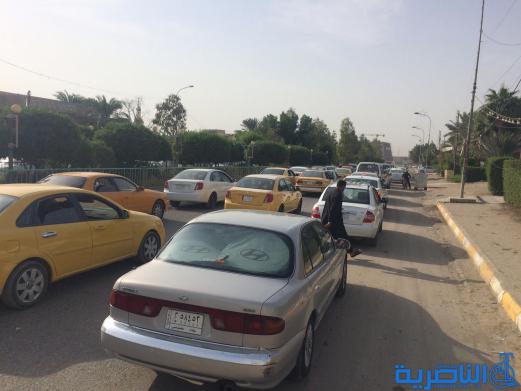 بالصور : اعمال صيانة تتسبب بزحمة مرور خانقة قرب مجلس ذي قار