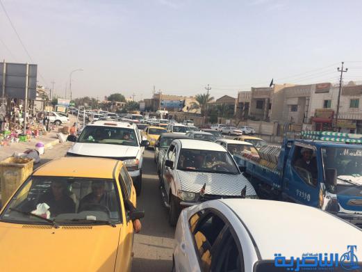  بالصور : اعمال صيانة تتسبب بزحمة مرور خانقة قرب مجلس ذي قار