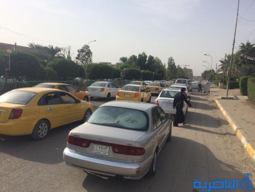  بالصور : اعمال صيانة تتسبب بزحمة مرور خانقة قرب مجلس ذي قار