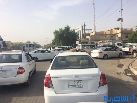  بالصور : اعمال صيانة تتسبب بزحمة مرور خانقة قرب مجلس ذي قار