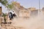 بلدية الناصرية تنفذ حملة واسعة في مناطق الفداء