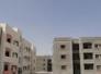  الى اللجنة المشرفة على توزيع الشقق السكنية