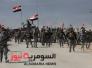 بالصور.. غبار الأرض وأعمدة الدخان تمد ظلاً فوق المقاتلين في صلاح الدين بالصور.. غبار الأرض وأعمدة الدخان تمد ظلاً فوق المقاتلين في صلاح الدين